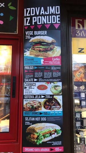 A portion of the menu visable from the street  at Rekalibracija Veganski in Novi Sad