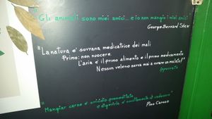 Beautiful, inspiring quotes around the restaurant at Veganfruttariano. at Veganfruttariano in Milan