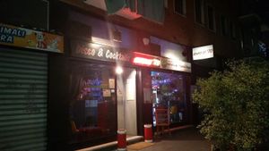 Store front for Veganfruttariano. They share space with a club but the night we went, the club was dark.  at Veganfruttariano in Milan