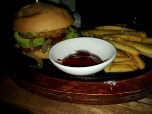 Vegan burger with fries at What Else Cafe in Hoi An