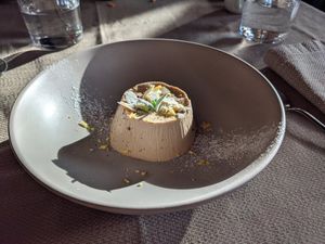 Panna cotta vegetale alla liquirizia at Ecosteria Parco Santi Angeli in Santi Angeli