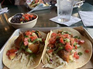 crispy avocado tacos and black beans with pico de gallo at Bomba Tacos & Rum in Fairlawn