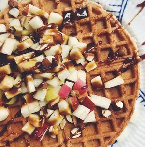 Gluten-free waffle with salted caramel sauce, apple and roasted almonds at Yellow Rose in Copenhagen