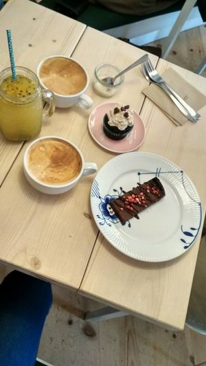 ?Yummy lemonade, espresso with steamed oatly, choco cupcake and brownieee  at Yellow Rose in Copenhagen