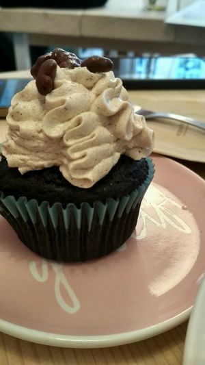 Chocolate cupcake with rum-cream frosting at Yellow Rose in Copenhagen