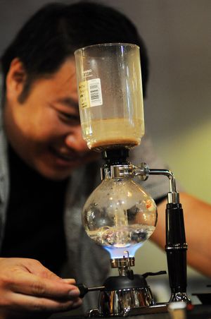 Making syphon coffee at Art Nature Cafe - Penang in Penang