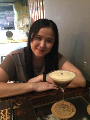 She love shakerato,  a special blend of espresso and honey lemon at Art Nature Cafe - Penang in Penang