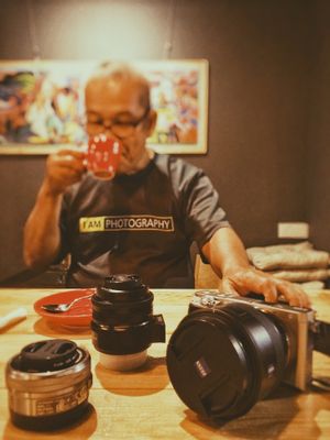 Photographer who enjoy black coffee at Art Nature Cafe - Penang in Penang