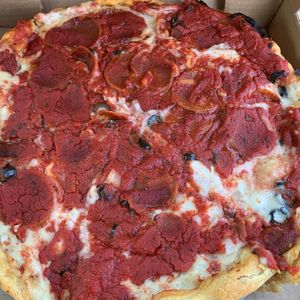 Vegan deep dish with behive pepperoni, black olives, and onion at 312 Pizza Company in Nashville