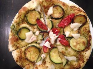 Zucchini pesto pizza with vegan cheese at Orchid Vegetarian Cafe in Surfers Paradise