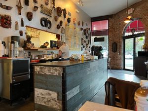 You can see the chef be a better cook than you will ever be, FOR FREE! at Foo Dog Curry Traders in Jacksonville