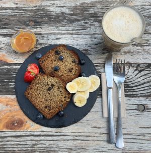 Banana cake with walnuts and chocolate and homemade salted caramel sauce (very delicious!!) & vanilla chai, all vegan  at Cafe Brooks in Hamburg