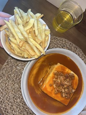 Francesinha and fries   at O Porto dos Gatos in Porto