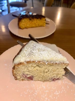 Coconut raspberry cake and choc orange cake  at O Porto dos Gatos in Porto