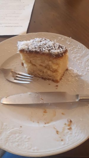 MOIST coconut cake, delicious (it was a big slice but here it was almost over :P) at O Porto dos Gatos in Porto