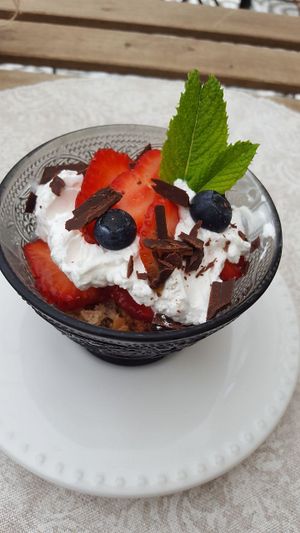 Cake, strawberries and cream dessert at O Porto dos Gatos in Porto