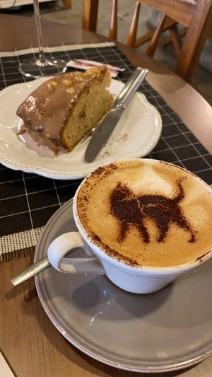 Spiced Apple Cake and Oat Milk Cappuccino  at O Porto dos Gatos in Porto