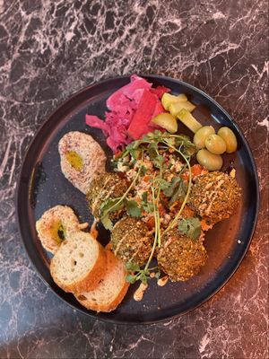 Homemade falafel on humus with taboulé  at Dirty Records Bar in Gothenburg