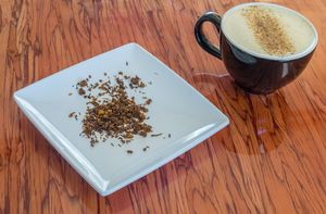 Turmeric Rooibos Chai with Macadamia Milk. at Cafe Red in Seattle