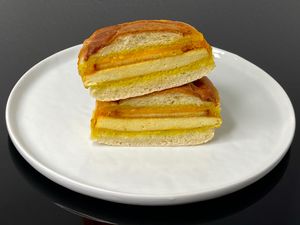 bacon breakfast sandwich (plated at home) at Cafe Red in Seattle