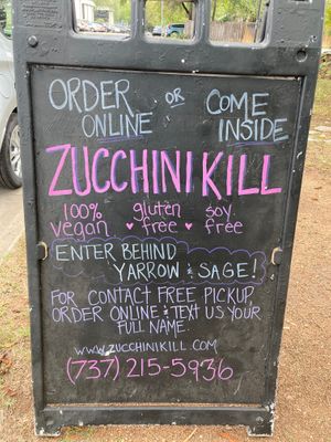 Sign outside at Zucchini Kill - North Loop in Austin