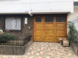 View from outside. Looks like a normal house   at Casa Vegetariana in Medellin