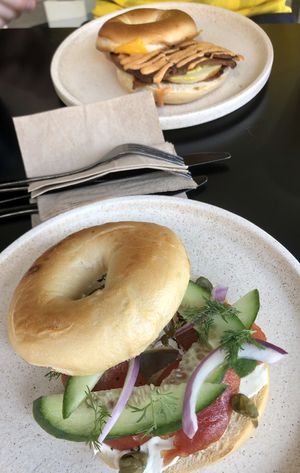Salmon bagel and bacon + egg roll  at Shift Eatery in Surry Hills