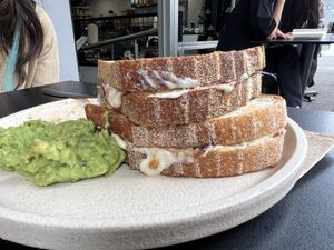 Say cheeese toasty with smashed avo side.   at Shift Eatery in Surry Hills