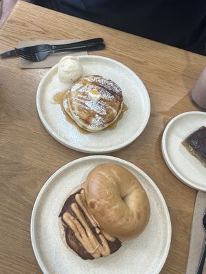 Pancakes and bacon and egg bagel, yum!   at Shift Eatery in Surry Hills