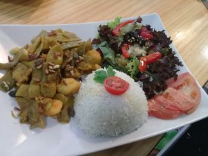 thai green beens with basmati rice and salad at Kuki's in Viella