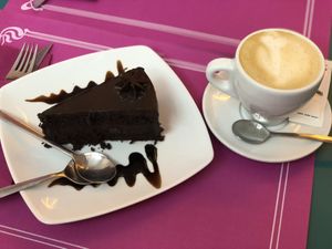 Chololate cake & Latte macchiato at Freedom Cakes Bakery in Madrid