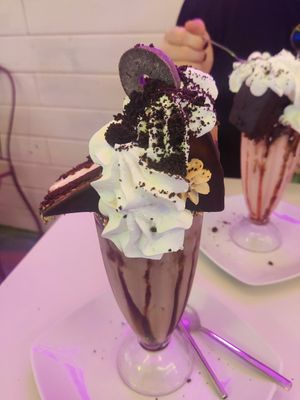Chocolate Freakshake with Choco-Peanut Cake, Cream, crumbled Oreos and Cookies at Freedom Cakes Bakery in Madrid