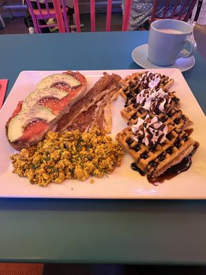 Brunch special ( pan con tomate y aguacate, vacon, tofu scramble, waffle with chocolate syrup)  at Freedom Cakes Bakery in Madrid