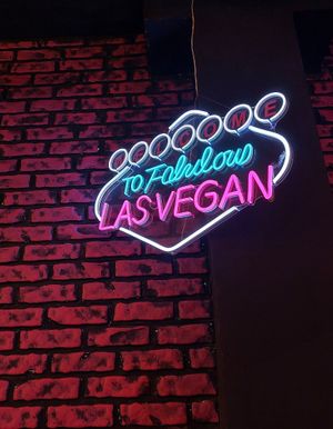 Neon sign inside at Freedom Cakes Bakery in Madrid
