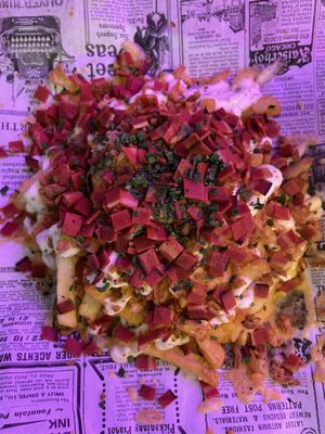 Fries + cheese + bacon  at Freedom Cakes Bakery in Madrid