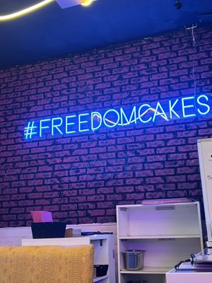 Inside neon dominates   at Freedom Cakes Bakery in Madrid