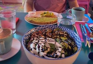 Brunch plate (avo toast) and "healthy" salad at Freedom Cakes Bakery in Madrid
