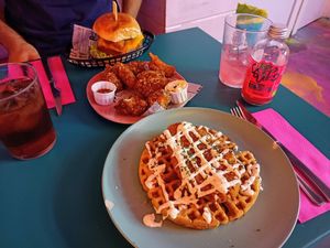 Vegan chicken burger, vegan chicken waffle, and caulo wings! at Freedom Cakes Bakery in Madrid