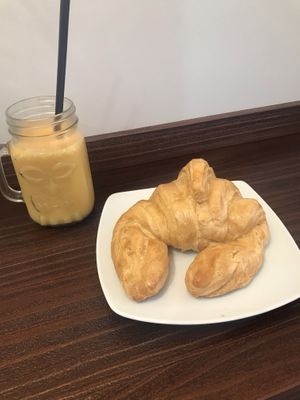 Croissant and smoothie  at Freedom Cakes Bakery in Madrid