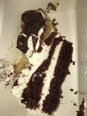 all smooshed but i promise they were still incredible 🤣 red velvet and tiramisu  at Freedom Cakes Bakery in Madrid