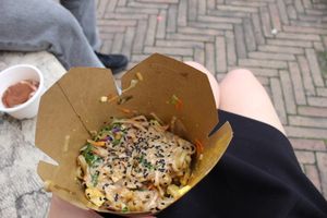 rice noodles with turmeric tofu, rocket, mushrooms and peanut sauce at ilBruno  in Florence