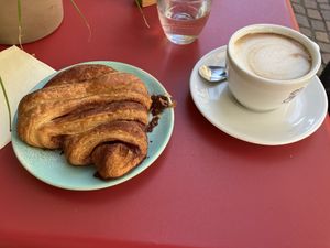 Franzbrötchen and oat milk flat white  at POP Der Kaffeeladen in Meersburg