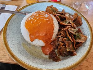 'Crispy Seitan' with rice & Portuguese sauce (14€) there's a salad buffet included to enrich the dish at Petiscaria in Helsinki