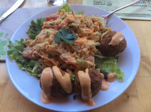 A lovely cooling salad and croquettes for a ot sunny day. at Simple Green in Zagreb