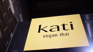 sign at Kati Vegan Thai in Seattle