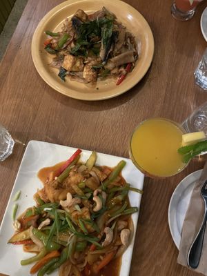 Pad keemao at the top and sweet and sour cashew on the bottom  at Kati Vegan Thai in Seattle
