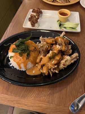 Chuchi Artichoke with rice; garlic jackfruit in the back  at Kati Vegan Thai in Seattle