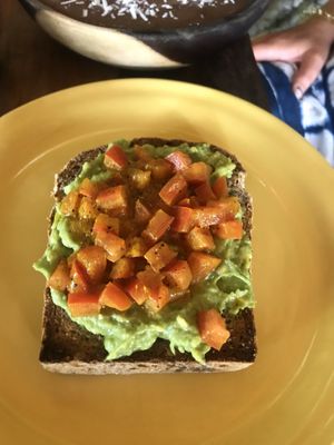 Turmeric avo on toast  at Con.Siente de LULU La Bruja in Bacalar