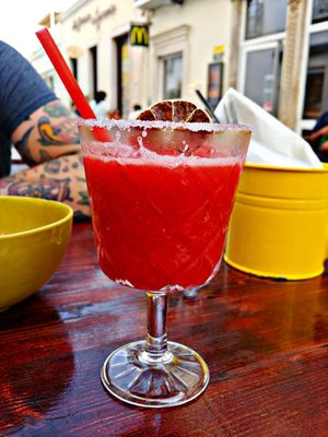Small frozen strawberry margarita at Guaka in Faro