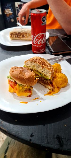Vegan Buger with their own vegan cheese. at Papa Tots in Puerto Escondido